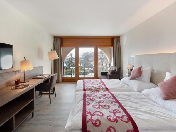 Hôtel des Vignes : photo 1 de la chambre chambre double ou lits jumeaux deluxe – vue sur jardin