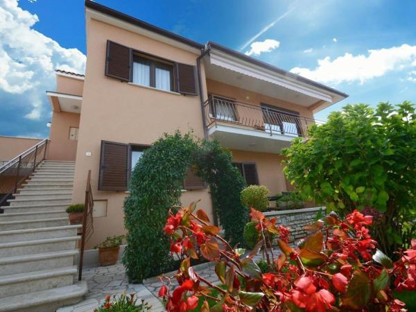 Lili : photo 3 de la chambre appartement - vue sur jardin