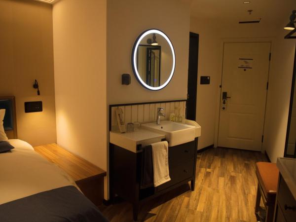 银座精宿(黄岛金沙滩香江路商业街店) : photo 4 de la chambre offre spéciale - chambre double