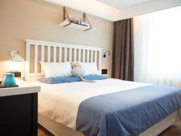 银座精宿(黄岛金沙滩香江路商业街店) : photo 1 de la chambre superior double room with audio 