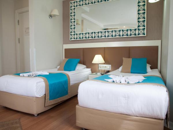 Nasa Flora Hotel : photo 8 de la chambre chambre double ou lits jumeaux standard - vue sur mer