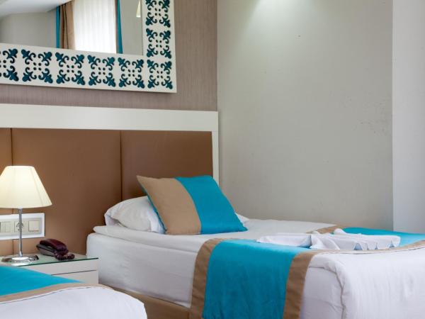 Nasa Flora Hotel : photo 7 de la chambre chambre double ou lits jumeaux standard - vue sur mer