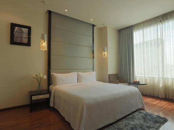 E Hotel : photo 1 de la chambre deluxe suite with 10% off on food & soft beverage