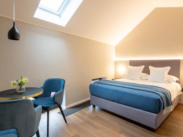 Binario 934 Smart Hotel : photo 2 de la chambre chambre supérieure mansardée lit queen-size