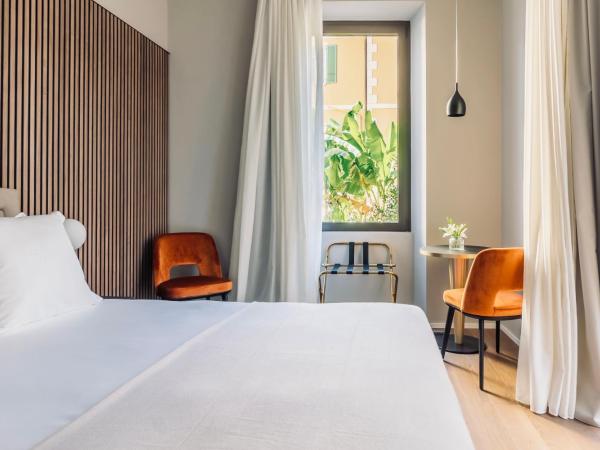 Binario 934 Smart Hotel : photo 2 de la chambre chambre lit queen-size