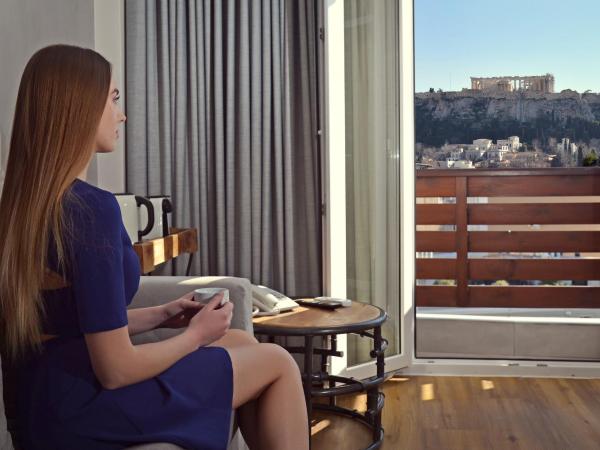 A.P. Acropolis View Apartments : photo 9 de la chambre suite avec bain à remous - vue panoramique sur acropole et lycabette