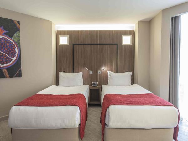 Ramada Encore by Wyndham Izmir : photo 1 de la chambre business room with land view