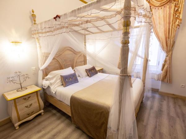 Chambre a Baldaquin Maison de L'Église Du couvent : photo 8 de la chambre chambre double avec salle de bains privative