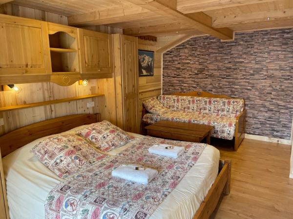 Chalet l'Aiglon : photo 4 de la chambre chambre triple – vue sur montagne