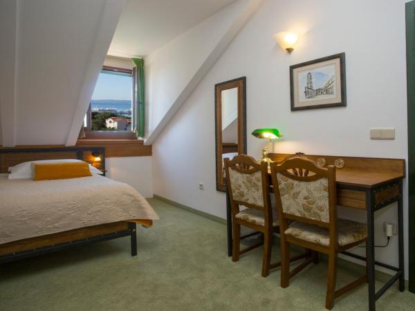 Hotel Villa Diana : photo 10 de la chambre chambre quadruple