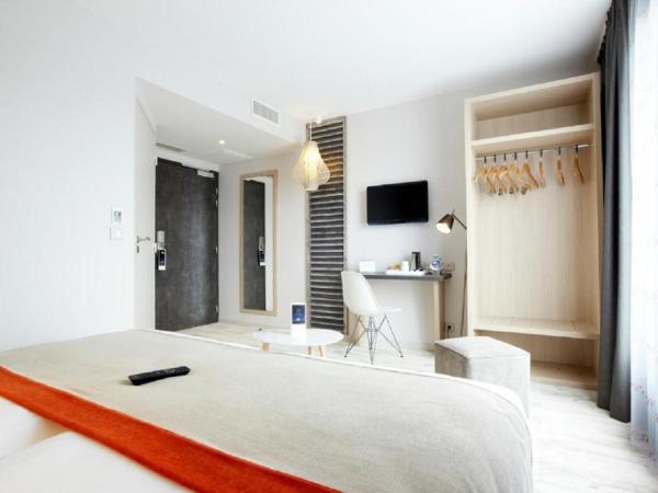 Kyriad Prestige Vannes Centre-Palais des Arts : photo 5 de la chambre chambre supérieure avec 2 lits simples