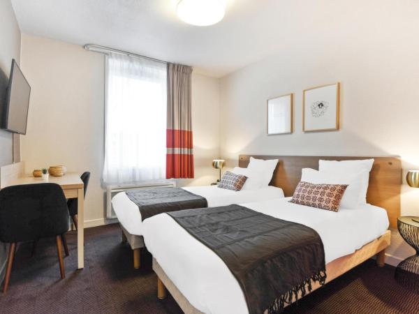 Appart'City Confort Lille - Euralille : photo 1 de la chambre studio lits jumeaux nouvelle génération