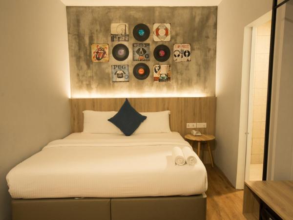 HOTEL CIQ, JALAN TRUS : photo 1 de la chambre chambre supérieure lit queen-size