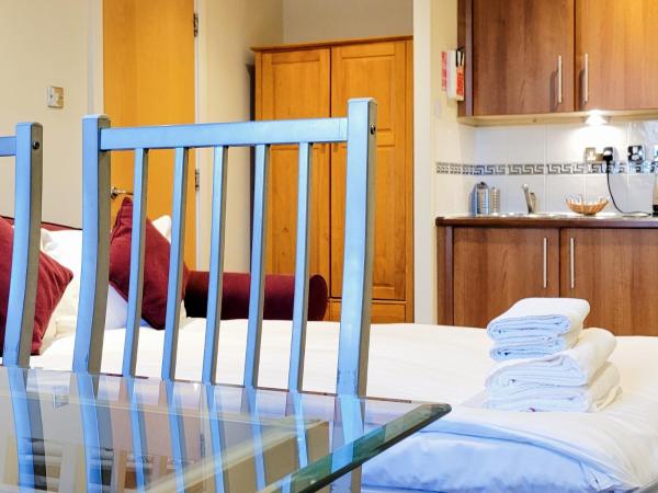 Grand Plaza Serviced Apartments : photo 4 de la chambre appartement triple exécutif