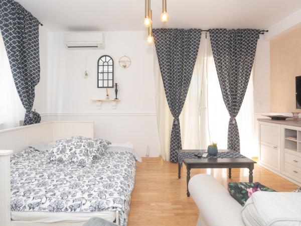 The Residence : photo 9 de la chambre appartement 1 chambre avec terrasse - vue sur lac