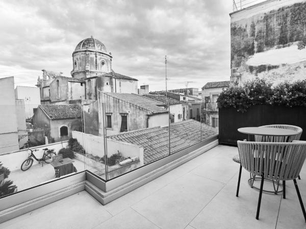 Palazzo Salomone : photo 9 de la chambre suite junior en duplex avec terrasse