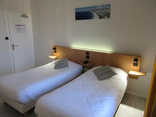 Contact Hotel de France : photo 6 de la chambre chambre lits jumeaux