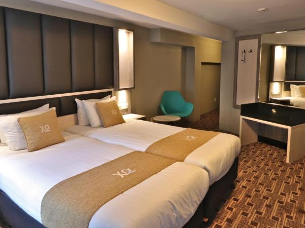 XO Hotels City Centre : photo 1 de la chambre chambre lits jumeaux