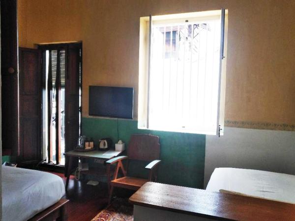 Ren I Tang Heritage Inn : photo 4 de la chambre chambre lits jumeaux