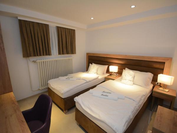 Hannover Zimmervermietung Mardino : photo 5 de la chambre chambre double ou lits jumeaux avec salle de bains commune