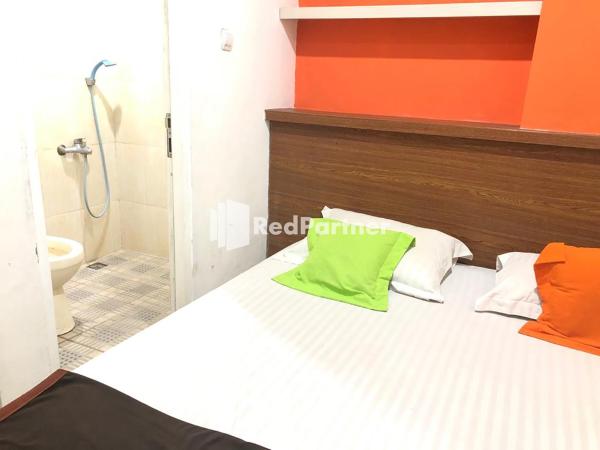 Seungit Syariah Inn Tebet Mitra RedDoorz : photo 1 de la chambre chambre double standard