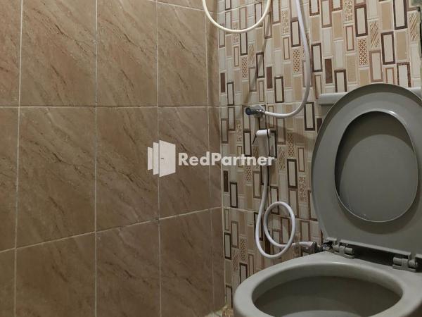 Seungit Syariah Inn Tebet Mitra RedDoorz : photo 5 de la chambre chambre double standard