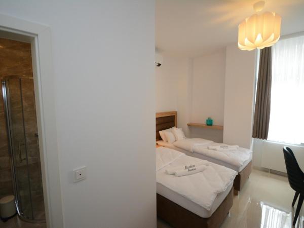 Hannover Zimmervermietung Mardino : photo 3 de la chambre chambre double ou lits jumeaux avec douche