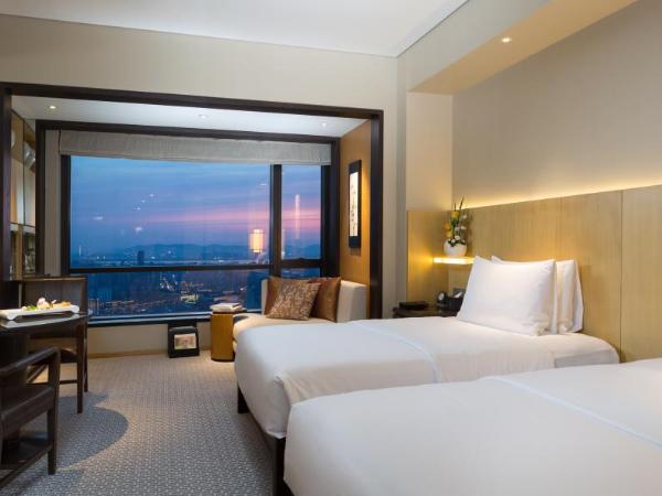 Jinling Hotel : photo 1 de la chambre yatai tower premier room(twin)