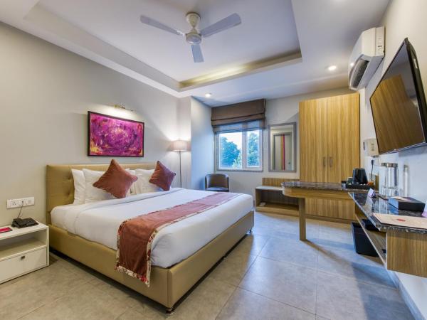 ROSASTAYS Gurugram Sec 31 : photo 1 de la chambre chambre deluxe double ou lits jumeaux
