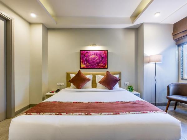 ROSASTAYS Gurugram Sec 31 : photo 3 de la chambre chambre deluxe double ou lits jumeaux
