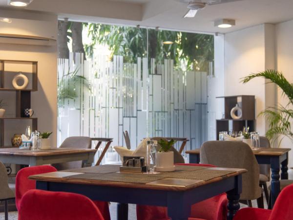 ROSASTAYS Gurugram Sec 31 : photo 6 de la chambre chambre deluxe double ou lits jumeaux