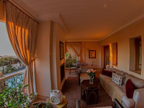 Le Riad Villa Blanche : photo 7 de la chambre suite junior exécutive avec cheminée et loggia