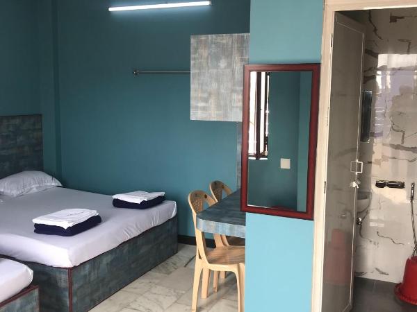 SM MANSION near Harbour & High court : photo 3 de la chambre chambre quadruple standard