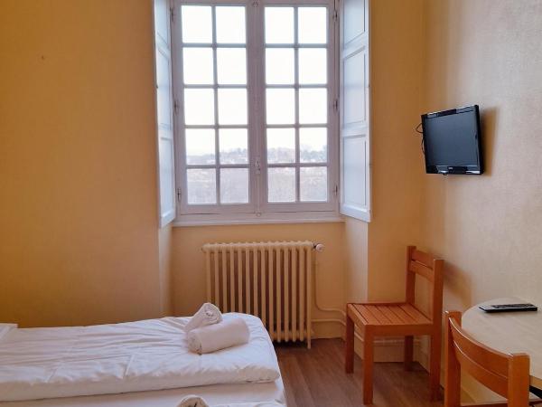 Hôtellerie Saint Yves : photo 3 de la chambre chambre lits jumeaux avec télévision 