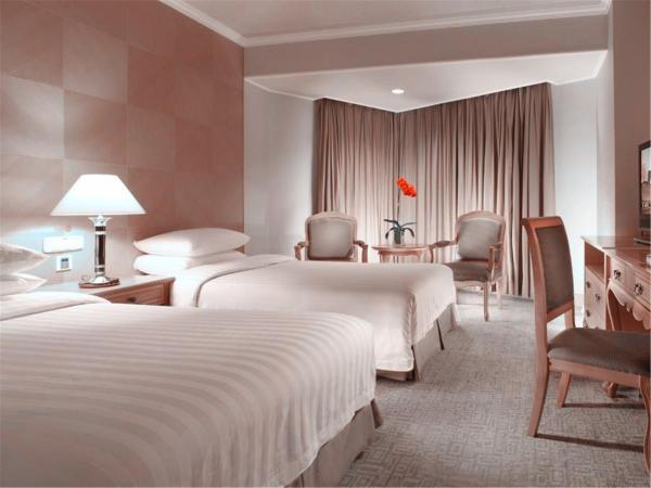 Beijing New Century Hotel : photo 1 de la chambre promotion voyage - chambre lits jumeaux standard