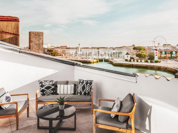 Maisons du Monde Hôtel & Suites - La Rochelle Vieux Port : photo 1 de la chambre suite junior avec terrasse - vieux port