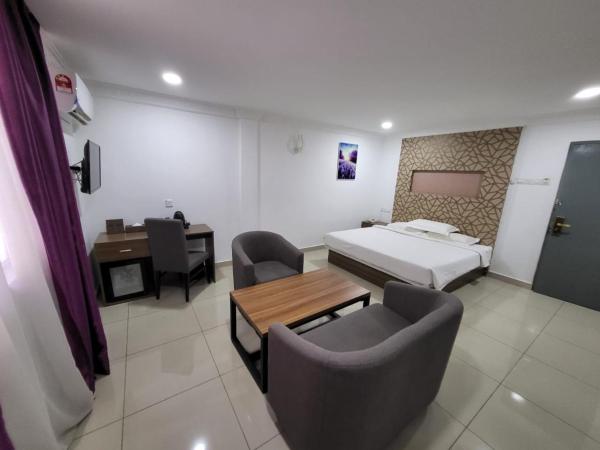 Poorna Hotel : photo 1 de la chambre suite supérieure lit king-size