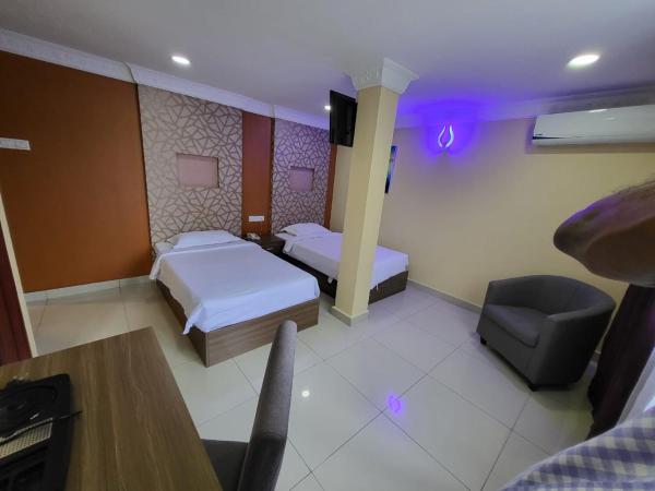 Poorna Hotel : photo 3 de la chambre chambre lits jumeaux supérieure