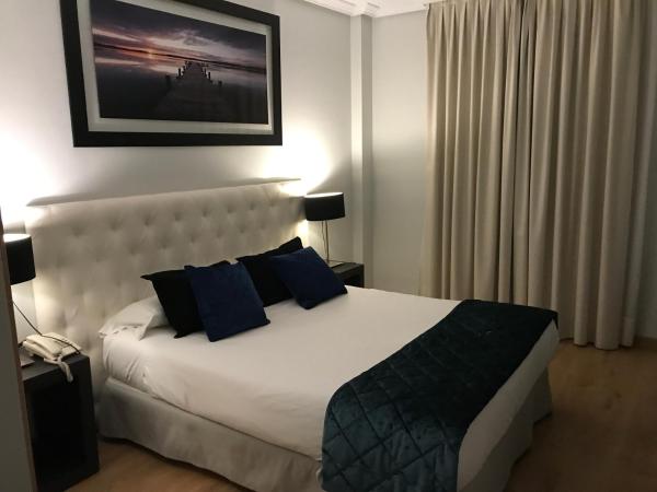 Hotel Suites Feria de Madrid : photo 4 de la chambre chambre lit queen-size 