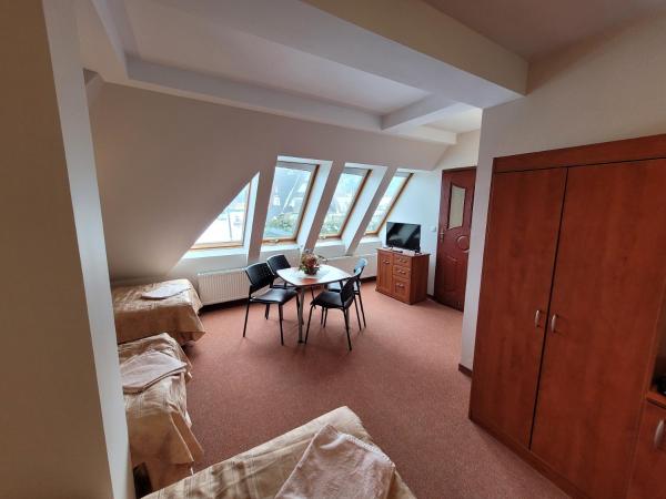 Willa Ostoja u Pyrca : photo 7 de la chambre chambre quadruple