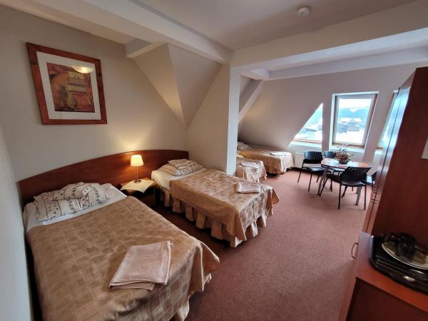 Willa Ostoja u Pyrca : photo 1 de la chambre chambre quadruple