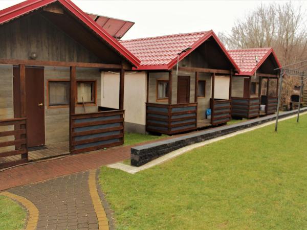 Camping domki letniskowe : photo 1 de la chambre cottage - vue sur jardin