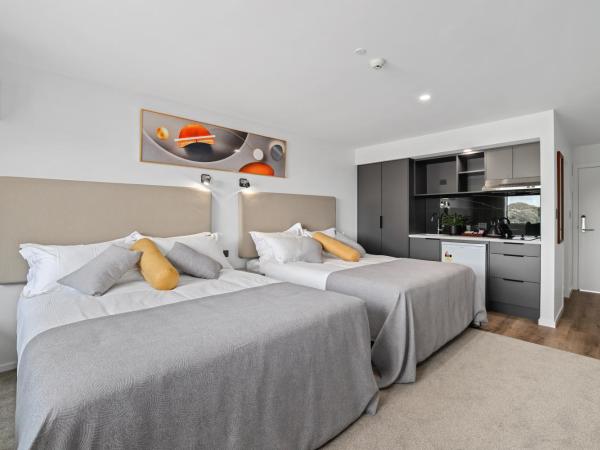 Golden Hotel : photo 1 de la chambre chambre deluxe avec 2 lits queen-size