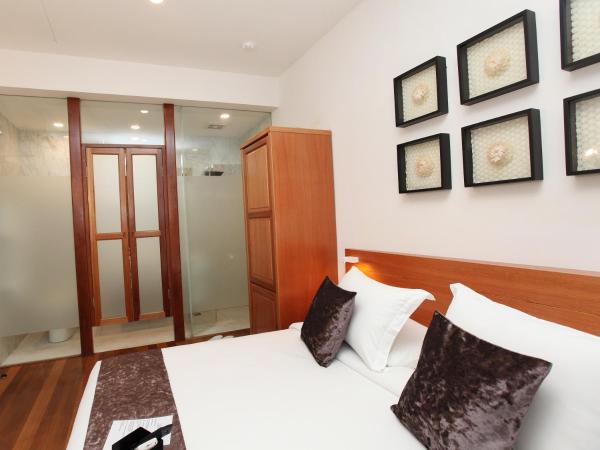 Gingerflower Boutique Hotel : photo 6 de la chambre chambre lit king-size deluxe