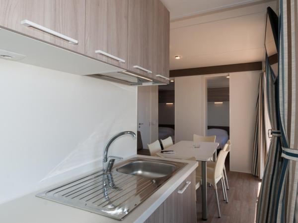 Club del Sole Jesolo Mare Family Camping Village : photo 10 de la chambre mobile home deluxe - animaux domestiques admis