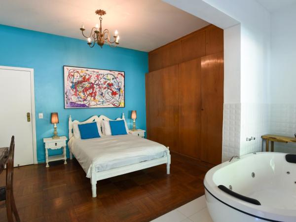 Rio Boutique Suites : photo 1 de la chambre chambre triple avec salle de bains