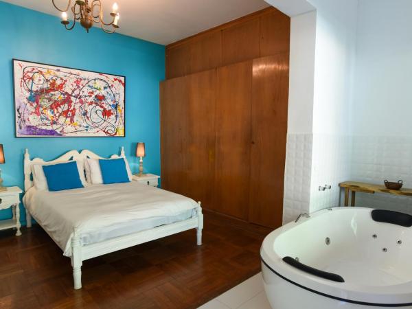 Rio Boutique Suites : photo 5 de la chambre chambre triple avec salle de bains