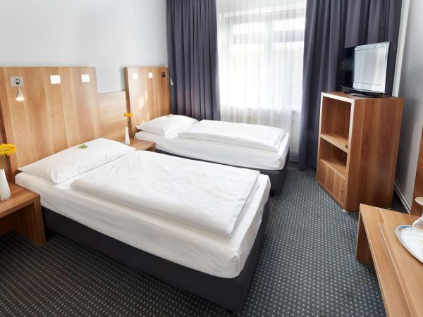 GHOTEL hotel & living Hannover : photo 3 de la chambre chambre affaires lits jumeaux