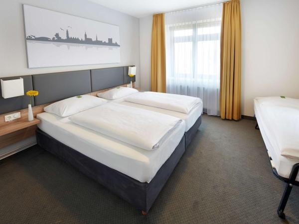GHOTEL hotel & living Hannover : photo 2 de la chambre chambre triple