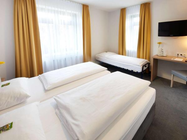 GHOTEL hotel & living Hannover : photo 3 de la chambre chambre triple